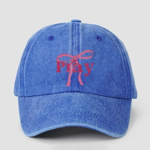 Washed denim baseball cap in dark blue with pink bow and Pray print for casual wear