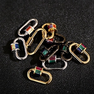 Detailed macro view of 18K gold plated lobster clasps with colorful micro zircon inlay