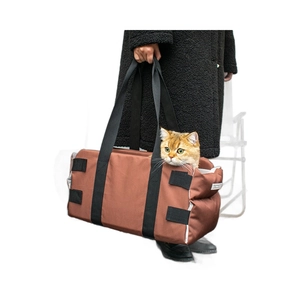 Portable orange pet car seat carrier for small dogs and cats with breathable mesh pockets