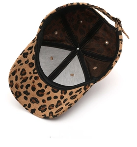 Detail view of leopard print corduroy baseball cap showing cotton lining and metal buckle