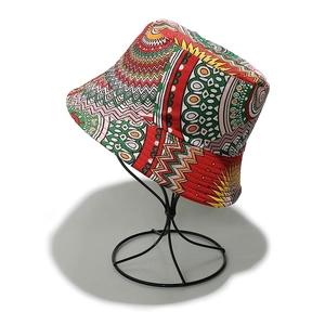 Detail of vibrant bohemian bucket hat with geometric African prints and fabric texture
