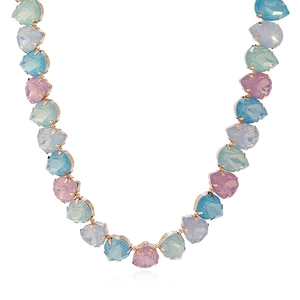 Vintage necklace with teardrop crystals in pastel pink, blue, and green on white background