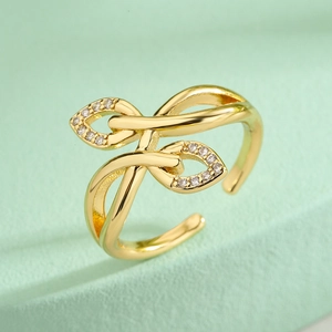 Macro shot of 18K gold plated leaf ring featuring sparkling zircon stones and leaf accents