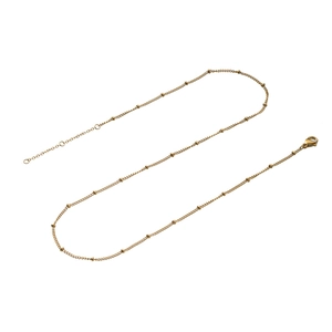 Detail of gold snake bone necklace chain with adjustable extender and lobster clasp closure