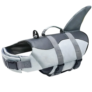Shark fin dog life jacket with adjustable straps and safety handle for swimming dogs