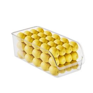 Transparent plastic egg storage box drawer for refrigerator with lemon inside