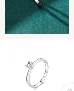 Detail shot of classic S925 sterling silver four-prong ring with S925 hallmark engraving