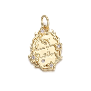 Golden oval copper pendant with floral design, gemstones, and Love You engraving