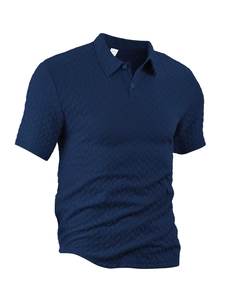 Detailed macro view of navy blue polo shirt with textured herringbone knit fabric