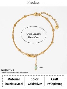 Detail of double-layer stainless steel anklet with green gemstone and PVD gold plating