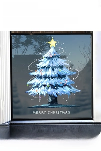 Blue Christmas tree window sticker with Merry Christmas text on a glass shopfront