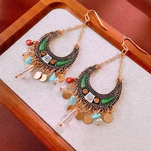 Ethnic bohemian crescent moon tassel earrings with green enamel and vintage beads