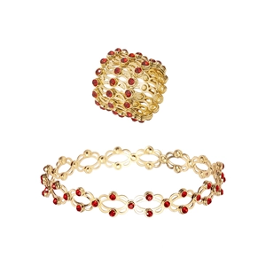 Creative 2-in-1 folding ring bracelet in gold finish with sparkling red rhinestones