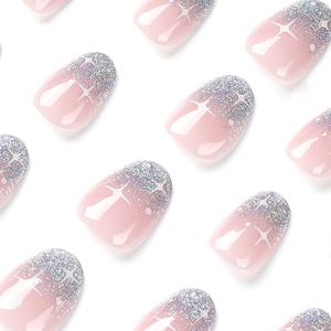 Short silver glitter French press-on nails with white star patterns on jelly pink base