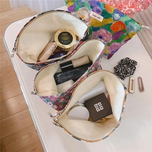Three vintage floral makeup bags with zippers showcasing large capacity storage