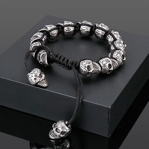 Men's retro titanium steel skull bracelet with black handmade braided rope on gift box
