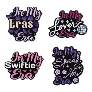 Set of four Taylor Swift Eras inspired enamel pins with colorful glitter finish