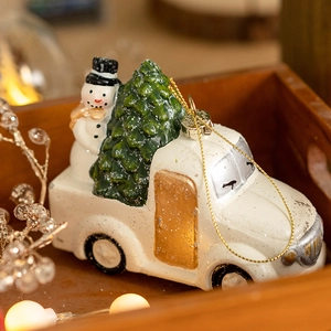 Vintage white Christmas truck ornament with snowman and tree in decorative wood box