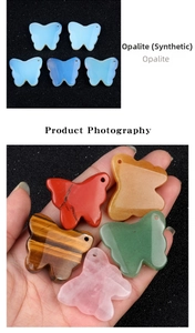 Macro detail of butterfly crystal pendants in various natural stone textures with top drill hole