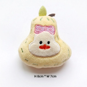 Detail of pear-shaped plush chick pendant with embroidery and dimensions H 8cm by W 7cm