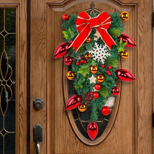 Christmas teardrop wreath for door with red bows, ornaments, and pine branches