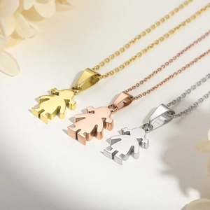Three minimalist little girl pendant necklaces in gold, rose gold, and silver finishes