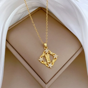 Titanium steel gold necklace with diamond-encrusted flower pendant in a luxury jewelry box