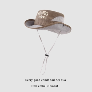 Detail of brown mesh sides and mountain logo on kids outdoor sun hat with chin strap