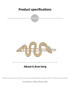 Detailed view of a 6.8cm golden snake hair clip with inlaid rhinestones and alloy material