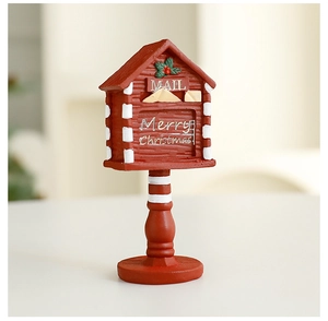 Detail view of red resin Christmas mailbox ornament with Merry Christmas greeting