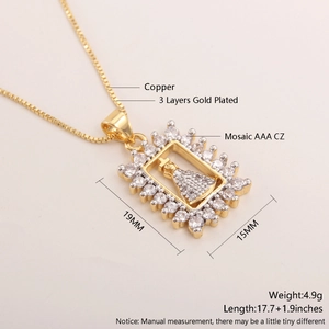 Macro detail of 18k gold plated Virgin Mary pendant necklace with AAA CZ stones