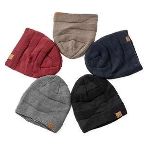 Five-pack knit beanies in mixed colors with faux leather F&S logo patches for winter