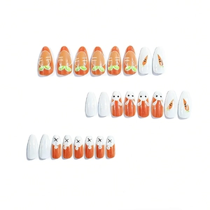 Almond-shaped press-on nails featuring cute orange carrot and white bunny designs