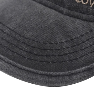 Close-up of dark grey washed baseball cap with reinforced multi-row stitching on the brim