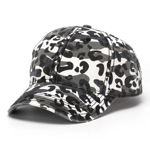 Detailed side view of washed cotton leopard print baseball cap with black and grey pattern