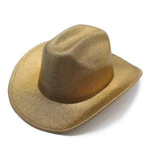 Detail of western gold cowboy hat featuring shiny glitter coating and classic wide brim