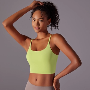 Detail of high-impact lemon green sports bra with thin straps and firm elastic hem