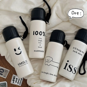 Insulated stainless steel water bottle with tea infuser in creamy matte finish