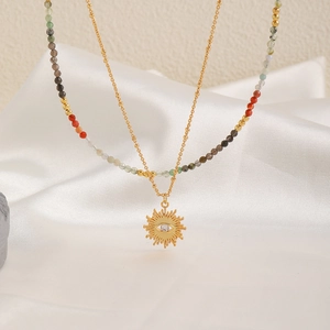 Handmade layered necklace with colorful natural stone beads and sun eye pendant