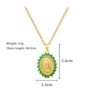 Detailed view of oval rotating portrait pendant with green gems and exact dimensions
