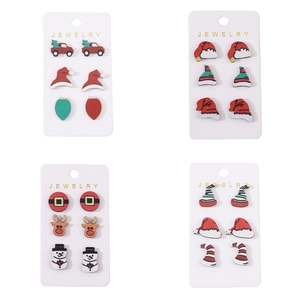 Christmas stud earring set with festive Santa hat, reindeer and snowman wood patterns