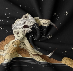 Close-up of vintage celestial tapestry fabric with golden moon and star patterns