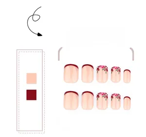 Detailed view of French red tips and floral patterns on short square press-on nails