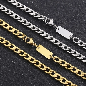 Parallel gold and silver 7mm stainless steel Cuban chains with engravable rectangular tags