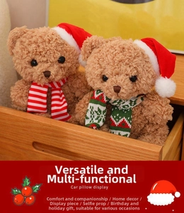Close-up of curly plush Christmas bears with festive scarves in a cozy wooden drawer