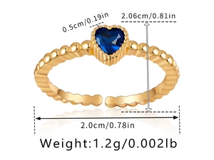 Detailed view of blue heart zircon ring with dimension measurements and golden bead band