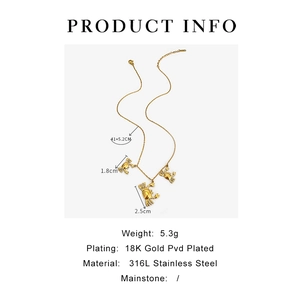 Detail view of gold crab pendant necklace with 316L stainless steel material specs