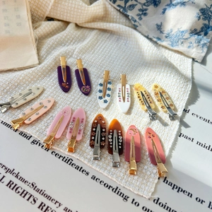 Barrettes à cheveux françaises en acétate avec strass et perles sur tissu gaufré