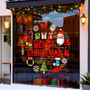 Vibrant Santa Claus and Christmas tree window stickers with Merry Christmas text for glass decor