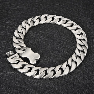 Detailed view of silver matte Cuban link chain necklace with creative bone-shaped buckle
